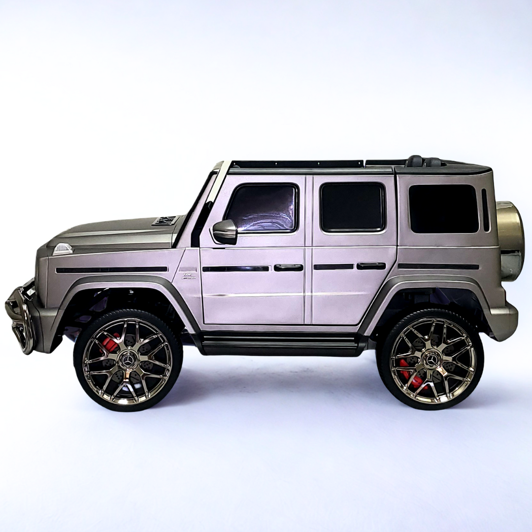 24V Mercedes Benz AMG G63 Exclusive 4x4 2-Seater Ride-On SUV W/ Rubber Wheels, Music Player, Floor Mat & RC