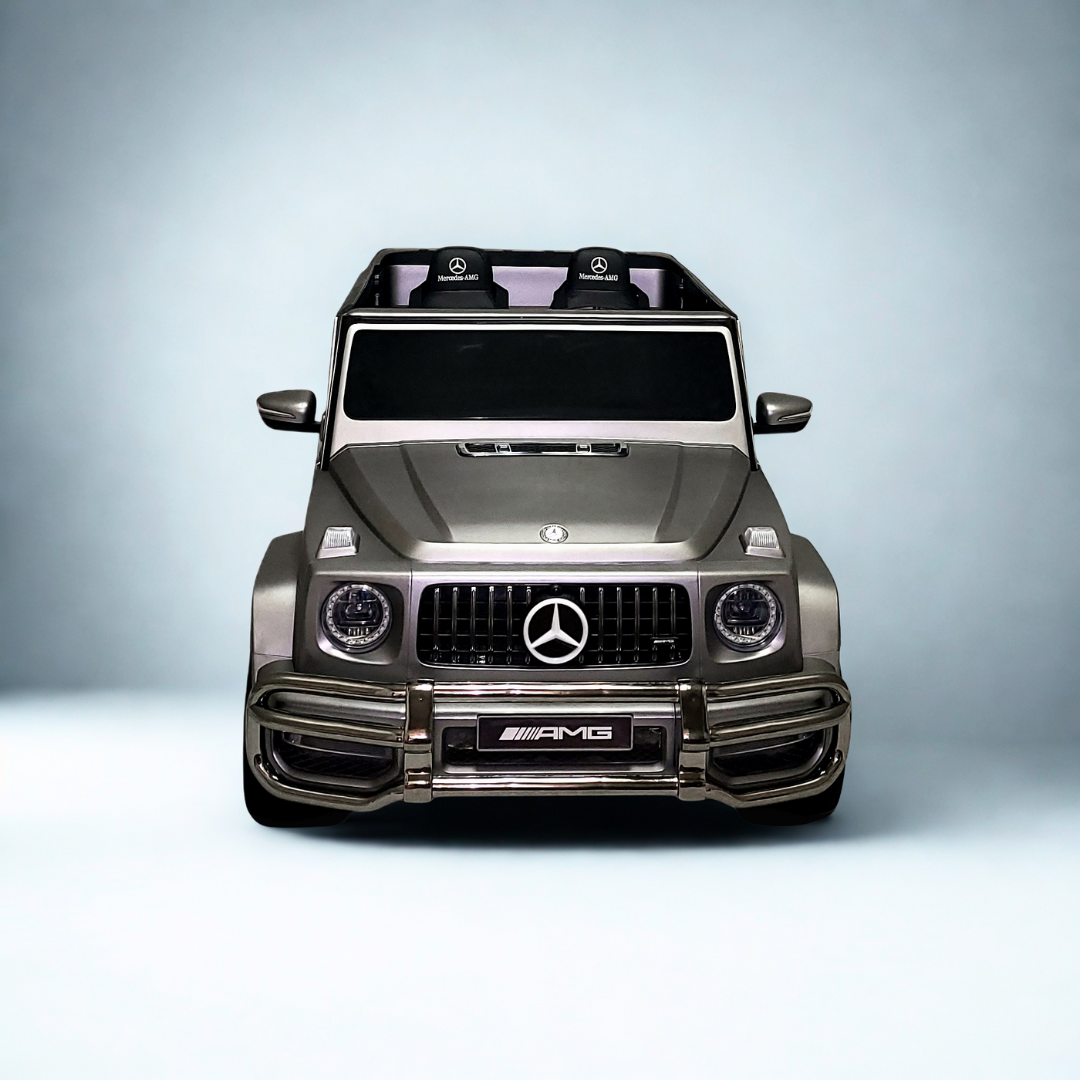 24V Mercedes Benz AMG G63 Exclusive 4x4 2-Seater Ride-On SUV W/ Rubber Wheels, Music Player, Floor Mat & RC