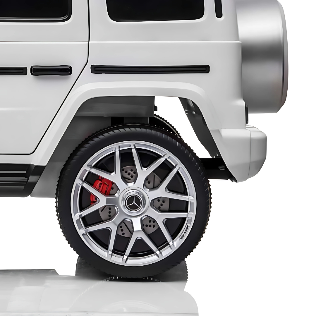 24V Mercedes Benz AMG G63 Exclusive 4x4 2-Seater Ride-On SUV W/ Rubber Wheels, Music Player, Floor Mat & RC