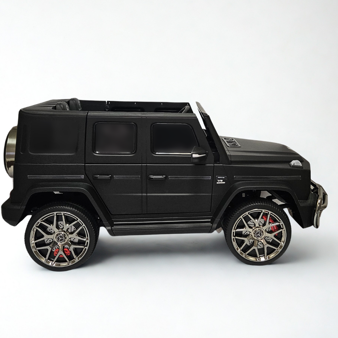 24V Mercedes Benz AMG G63 Exclusive 4x4 2-Seater Ride-On SUV W/ Rubber Wheels, Music Player, Floor Mat & RC