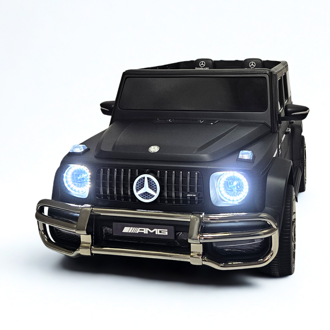 24V Mercedes Benz AMG G63 Exclusive 4x4 2-Seater Ride-On SUV W/ Rubber Wheels, Music Player, Floor Mat & RC