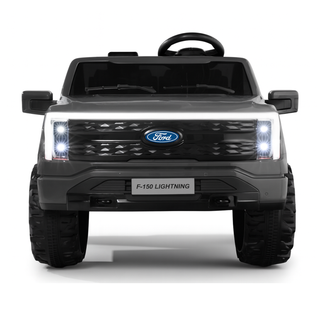 24V Ford F-150 kids ride-on truck front view with LED lights and large tires.