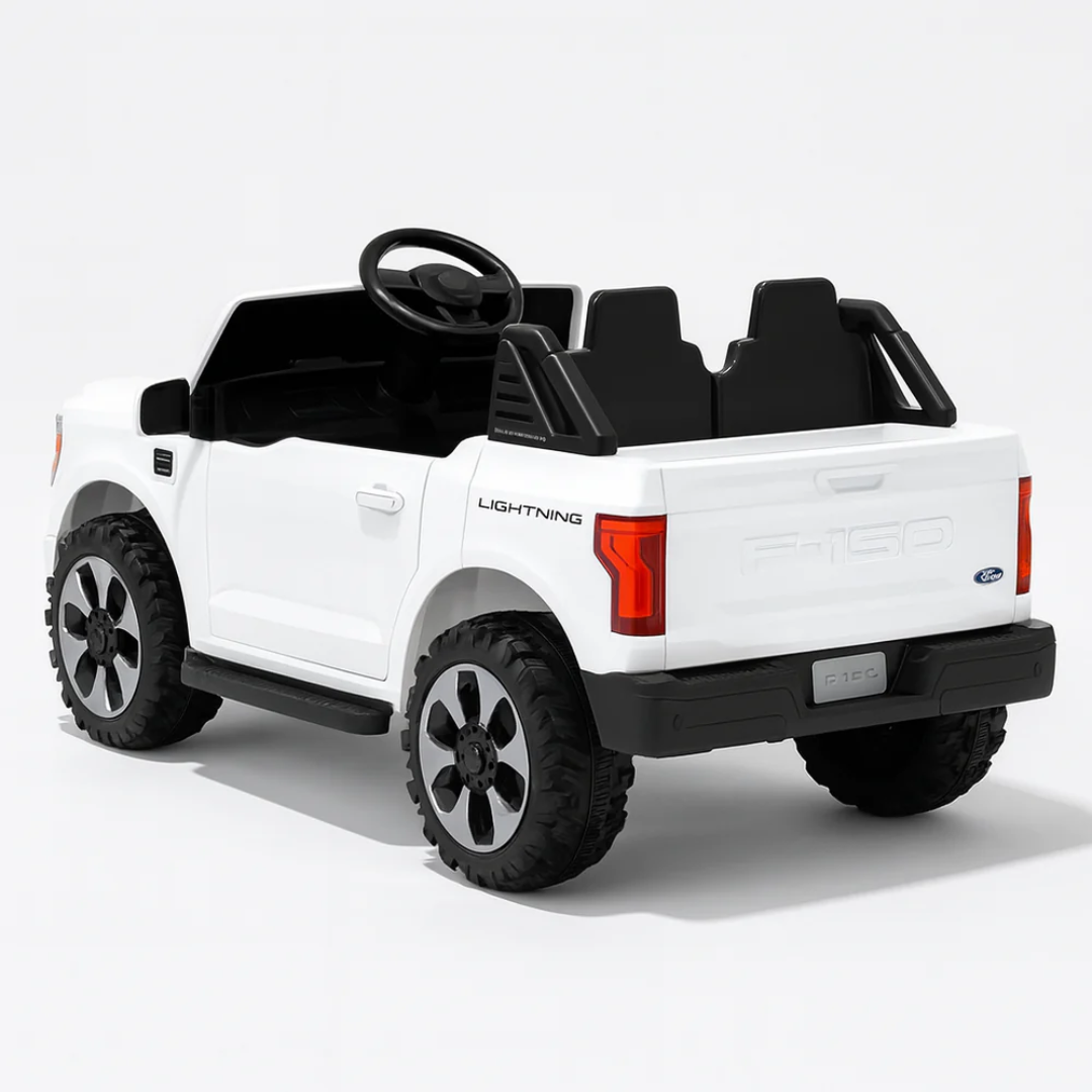 24V Ford F-150 kids ride-on truck in white with spacious cabin and realistic design.