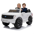 24V Ford F-150 kids ride-on truck with two children seated, featuring realistic design and large wheels.