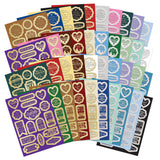 Essential Book Of Christmas Sentiments 2024 die-cut sentiments in festive colors and foil designs, perfect for holiday crafting.