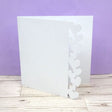 Fancy-Edge Blanks Hearts Edge decorative craft paper sheets with heart-shaped edges.